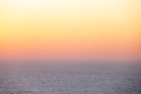 Beautiful morning sunset sky with soft blur pastels gradient background .の写真素材