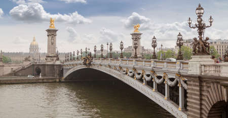 Panorama with Pont Alexandre III Bridge and overlooking the old city, cloudy day. France Parisの写真素材