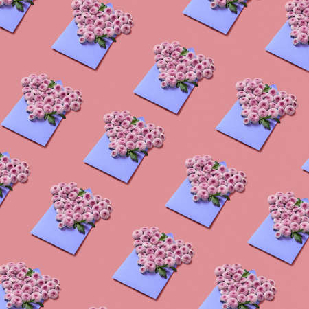 Floral pattern of congratulation envelopes with hardy chrysanthemums on a pastel background.の写真素材