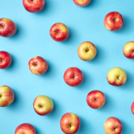 Fruit apples pattern on blue.の写真素材