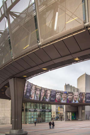 Wide angle shot with people walking by European Parliaments Leopold Squareのeditorial素材