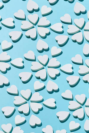 Blooming pattern made from plaster hearts with shadows.の写真素材