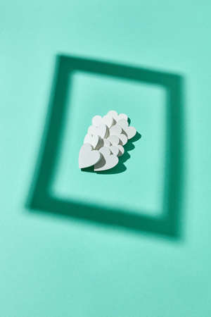 Valentines hearts set in the frame from rectangular shadows.の写真素材