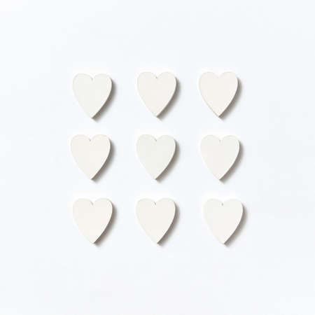 Valentines square pattern from paper hearts. Flat lay.の写真素材