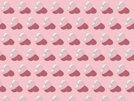 Horizontal Valentine's holiday pattern from vertical hearts made from gypsum on a pastel pink...