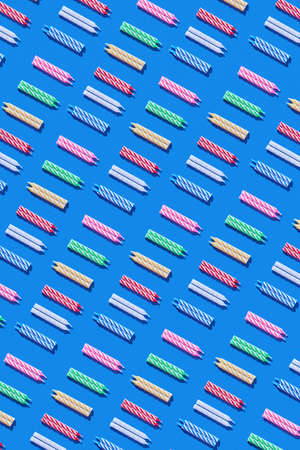 Creative background from pattern of colorful candles for cake.の写真素材