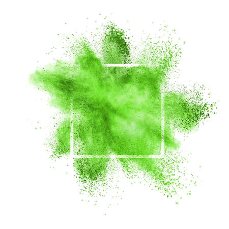 Green dust or powder explosion in a square frame on a white background, copy space.の写真素材