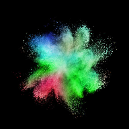Decorative abstract multicolored powder splash or explosion on a black background with copy space.の写真素材