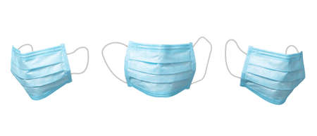 Flying set from three medical masks as a protection on a white background.の写真素材