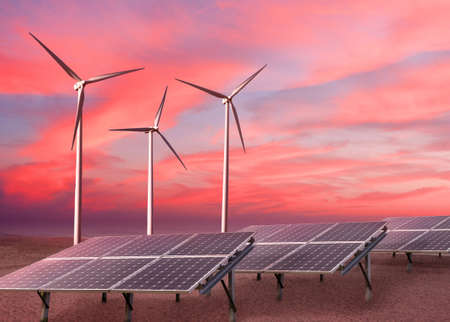Wind turbines and solar panels as alternative renewable energy.の写真素材
