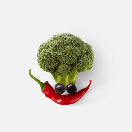 Natural fresh vegetable composition in the shape of funny face.の写真素材