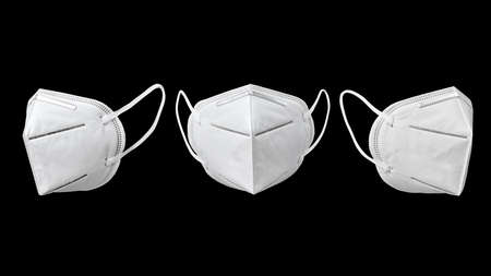 Three medical face masks for protection on a black background.の写真素材