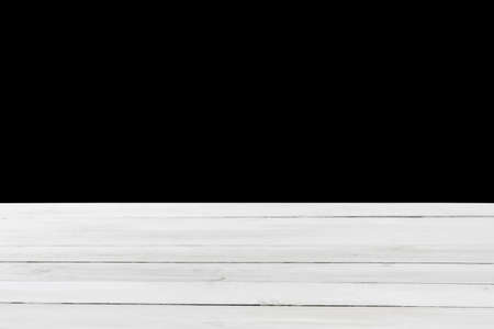 Blank grey wooden table for display or montage your products on a black background.の写真素材