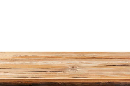 Aged natural wooden table for montage or expose products on a white background.の写真素材