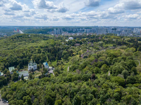 Aerial view of church in botanical gardenの写真素材