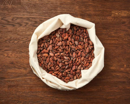 Sack of organic unpeeled cocoa beansの写真素材
