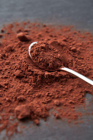 Pile of dry organic cocoa powderの写真素材