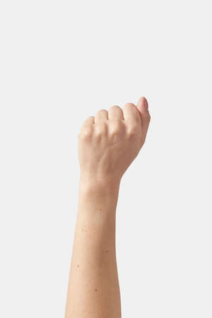 Fist up, victory symbol female hand.の写真素材