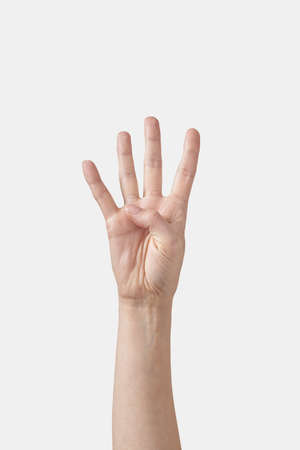 Counting on fingers, number four on white.の写真素材