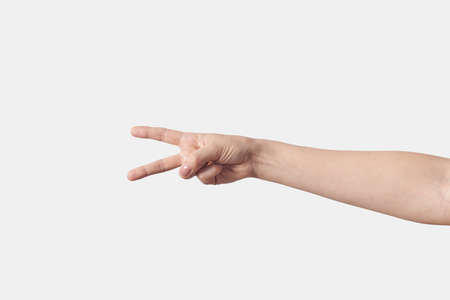 Horizontal victory gesturing female hand.の写真素材
