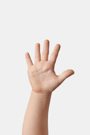Child hand counting on fingers, five.の写真素材