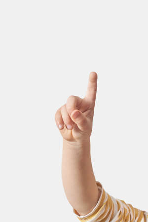 Child hand counting on fingers, one.の写真素材