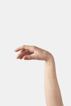 Close up young female hand tired gesture on white.の写真素材