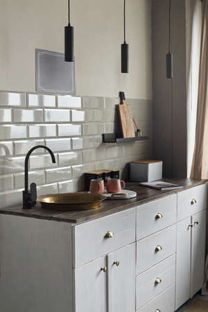 Elegant creative small kitchen at country house.の写真素材