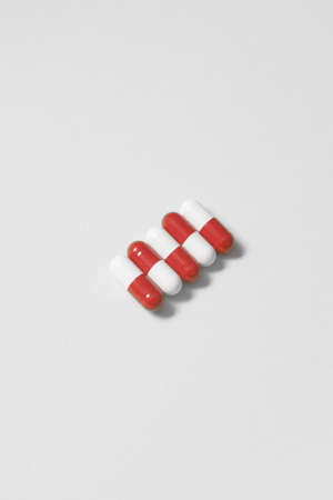Pharmaceutical tablets over white background.の写真素材