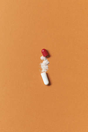 Pharmaceutical tablet with medication powder.の写真素材