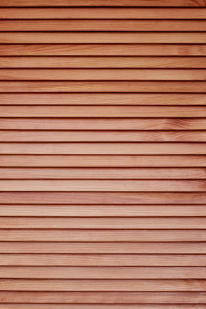 Grunge wooden textured wall background. Natural pattern of modern panel with horizontal wooden slats.の写真素材
