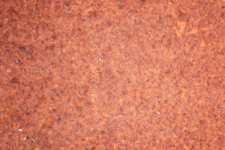 Red grunge stone textured wall background. Abstract rustic brown surface.