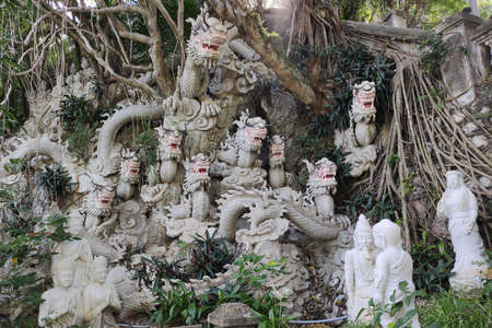 DA NANG, VIETNAM - NOVEMBER: Marble mountains scenic view near Da Nang city. White sculptures of dragons outside of cave.のeditorial素材