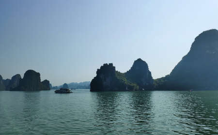 Picturesque view of UNESCO Ha Long bay. Tourist boats are floatingのeditorial素材