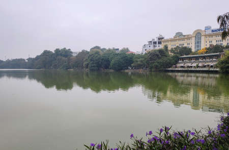 View on the lake of the returned sword and lake of green water Ho Hoan Kiem in the center of Hanoi.のeditorial素材