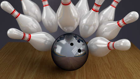 Bowling Ball and Pins on Moment of Strike Impactの写真素材