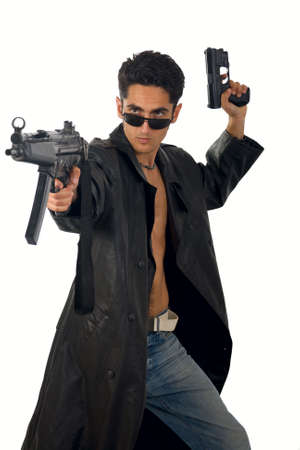 Man with gun in leather raincoat. Isolated on white backgroundの写真素材