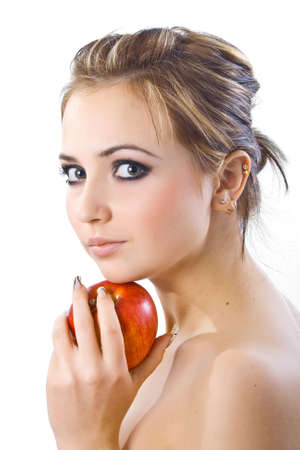 Beautiful girl  with red apple on white background.の写真素材