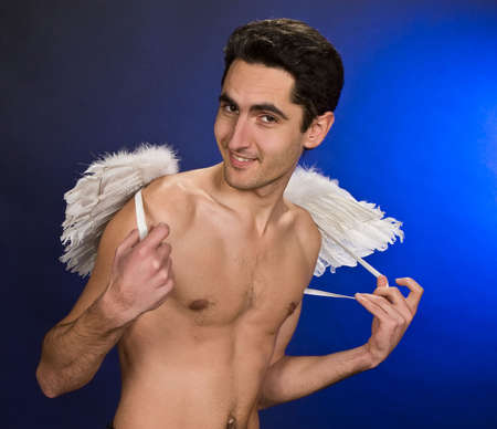 Portrait of glamour man with white wings. の写真素材