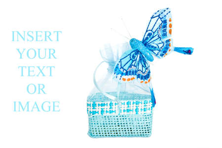 Blue straw paper-bag with butterfly  Isolated on white background の写真素材