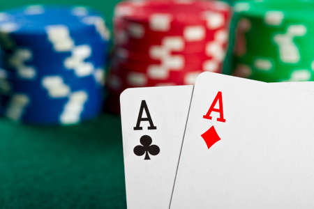 Chips and cards for the poker on the table 