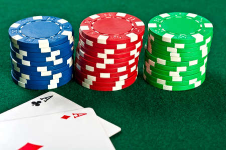 Chip and cards for the poker on the table  