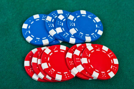 Group of chips on the green cloth.の写真素材