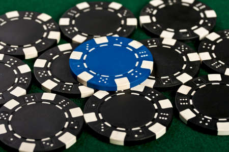 Group of chips on the green cloth の写真素材