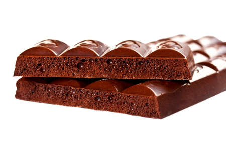 Dark chocolate bar isolated on white backgroundの写真素材