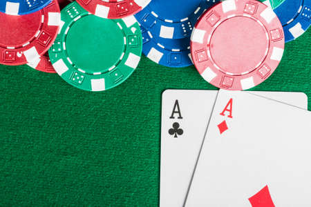 Chip and cards for the poker on the table  