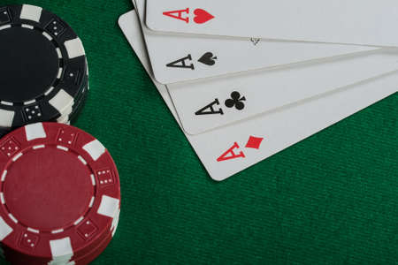 Chips and cards for the poker on the table 