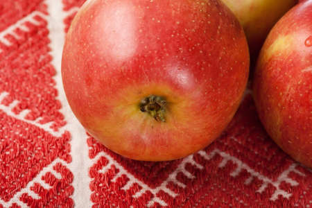 red apples on red tablecloth  country style
