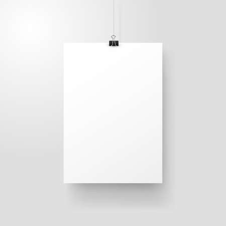White poster hanging on binder. Grey wall with mock up empty paper blank. Layout mockup. Vertical template sheetのイラスト素材