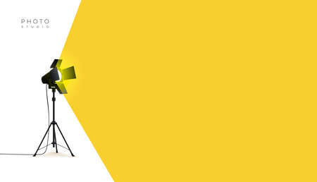 Photo studio lamp. Spotlight concept. Spotlight shines with yellow light from the left side. Place for text for your design. Vector illustration photo studio flashes light bulb icon.のイラスト素材